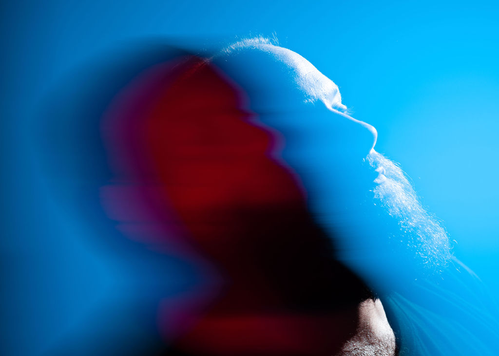 Portrait in blue of Chris Kaplan by Christopher Bruno